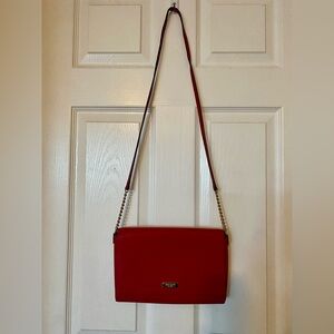 Gently used red crossbody Kate Spade crossbody purse